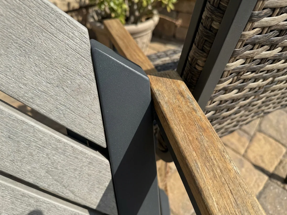 Outdoor Chair Buying Guide: Pick One That Survives Your Climate 3 Close-up of teak, aluminum and woven resin outdoor chair materials in natural light